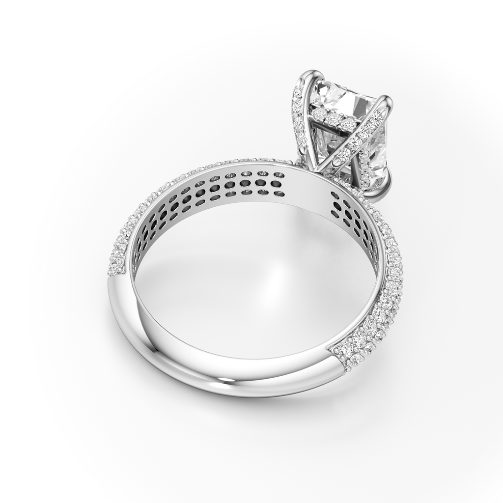 A silver-toned diamond ring with a large round-cut center stone and a halo of smaller diamonds, shown on a clean white background.