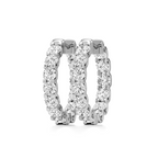 Three silver-toned eternity rings set with clear round-cut gemstones, arranged side by side on a clean white background.