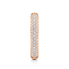 Side profile of a rose-gold oval hoop earring showing the narrow pavé-set band.