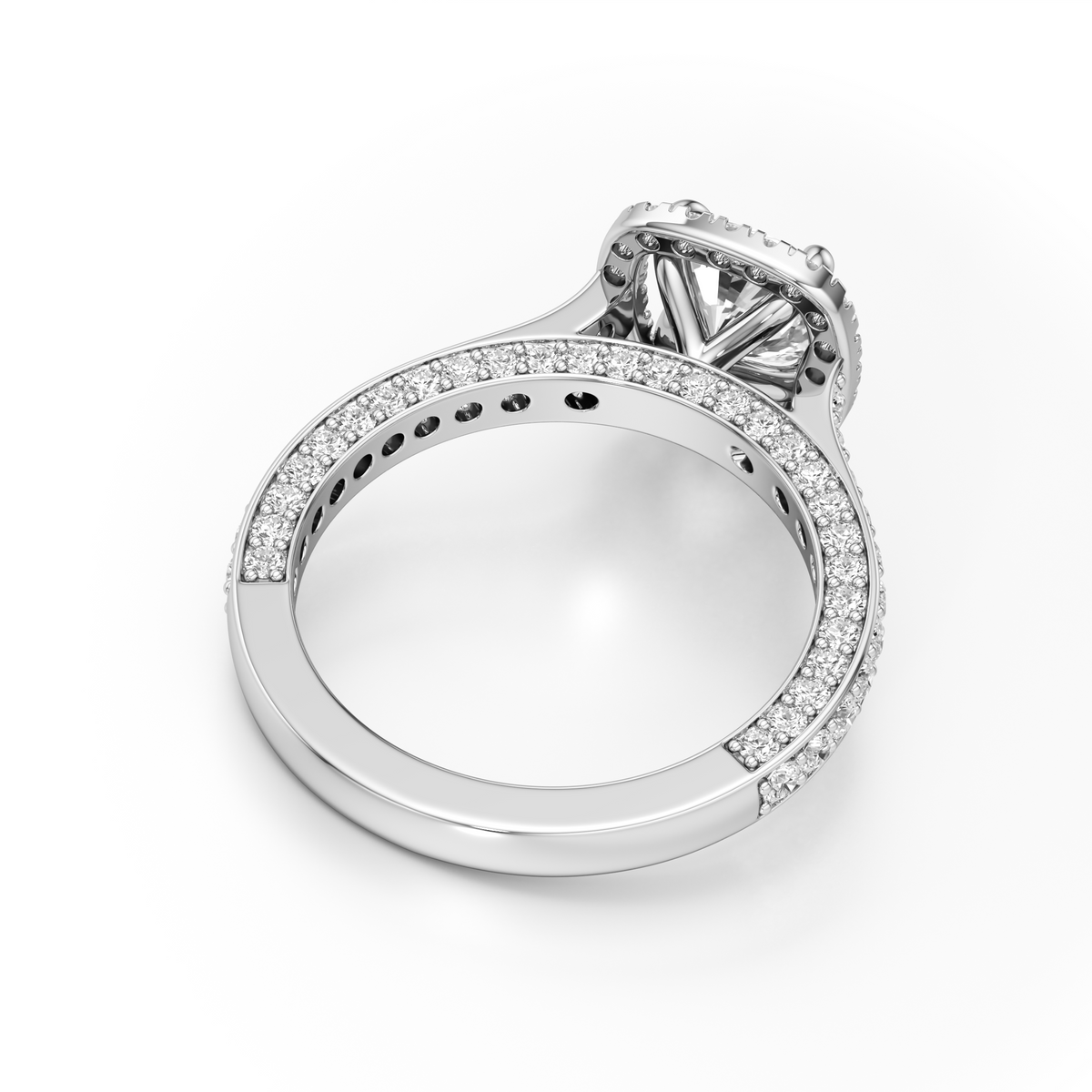 A silver-toned diamond ring with a round-cut center stone and a pavé-set band, shown on a clean white background.