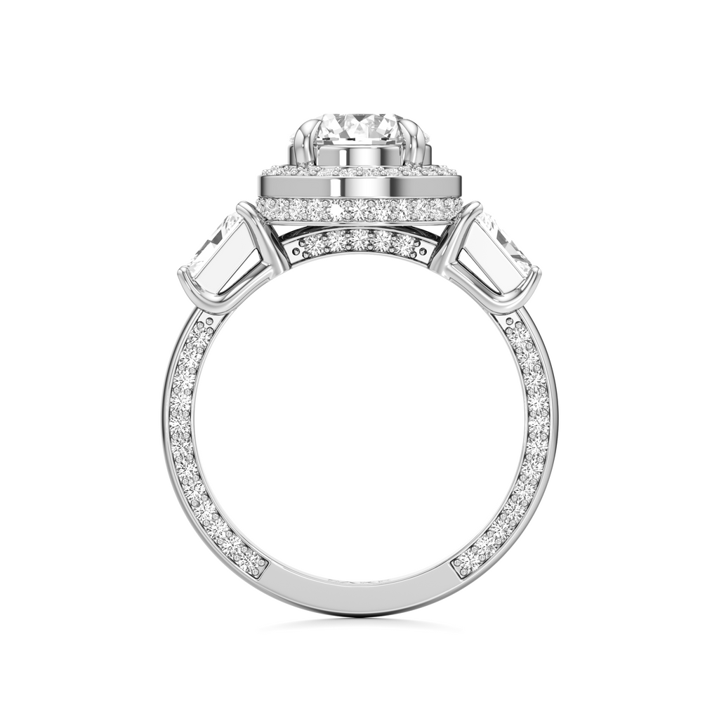 A silver-toned diamond ring with a large round-cut center stone, a halo of smaller diamonds, and a shank pavé-set with rectangular baguette diamonds, shown on a plain white background.