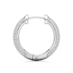 A silver hoop earring with pavé-set clear stones on the outer band, shown against a plain white background.