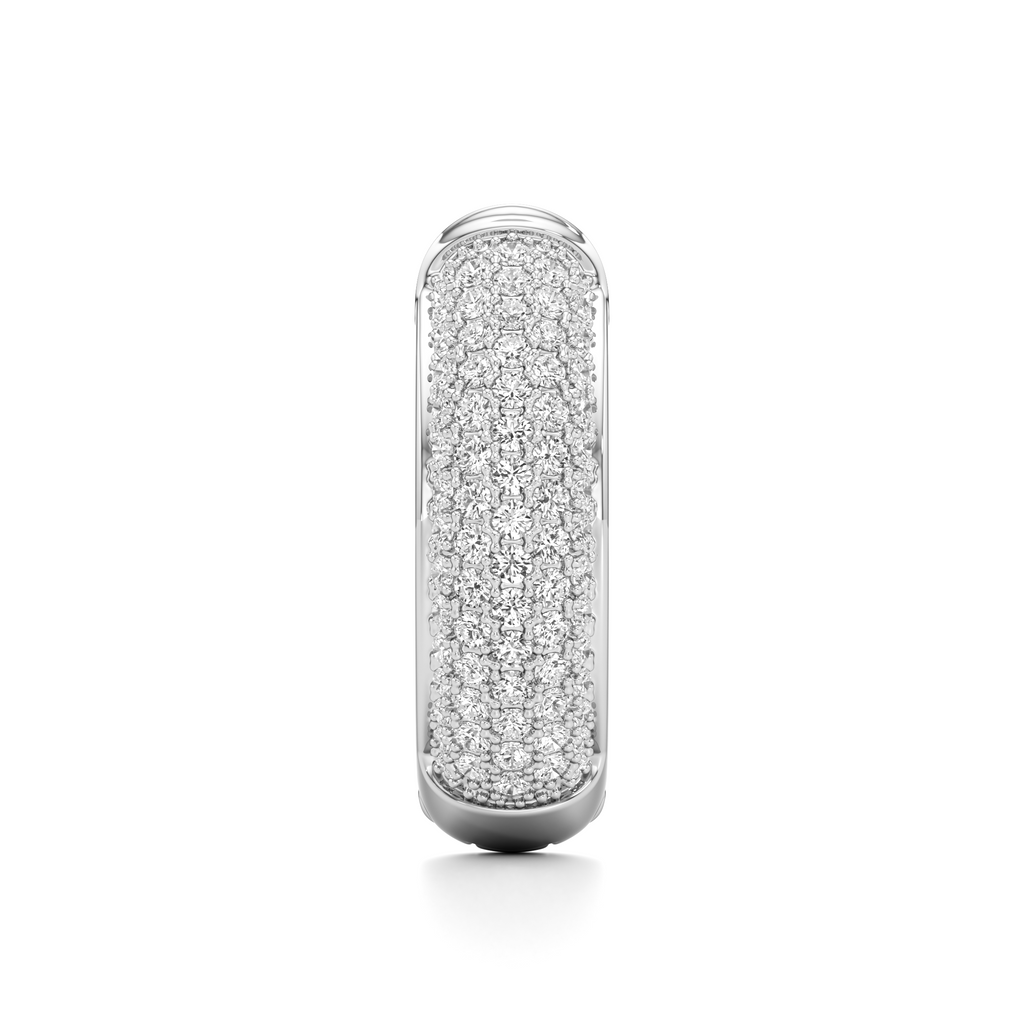 A silver-toned huggie ring featuring a pavé diamond band, shown vertically against a clean white background.