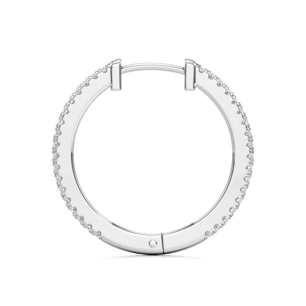 A silver hoop earring with a textured, beaded outer edge and a smooth polished inner band, shown on a plain white background.