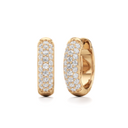 Pair of Selene pavé huggie earrings in a gold-tone finish, featuring rows of sparkling clear stones along the front.