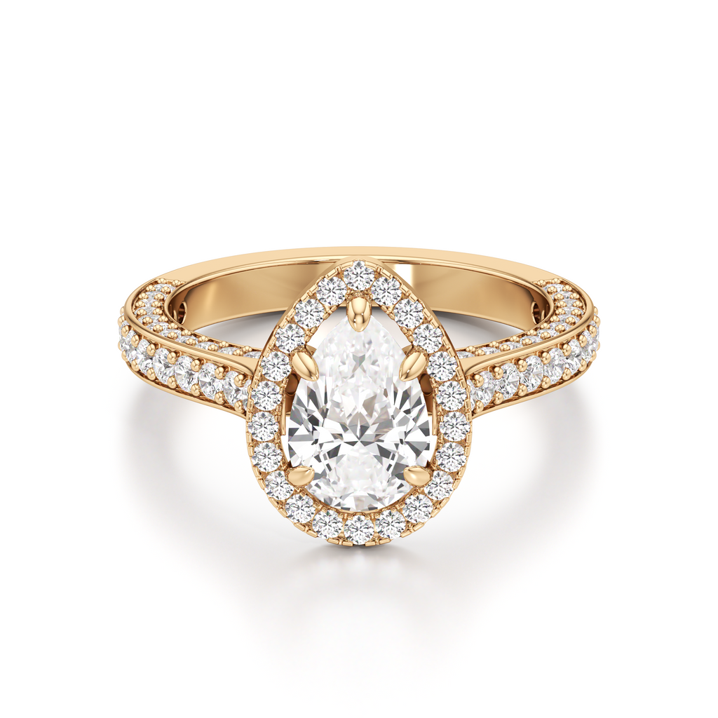 Gold-tone pear-shaped diamond ring featuring a central pear-cut stone, a surrounding pavé halo, and sparkling stones along the band.