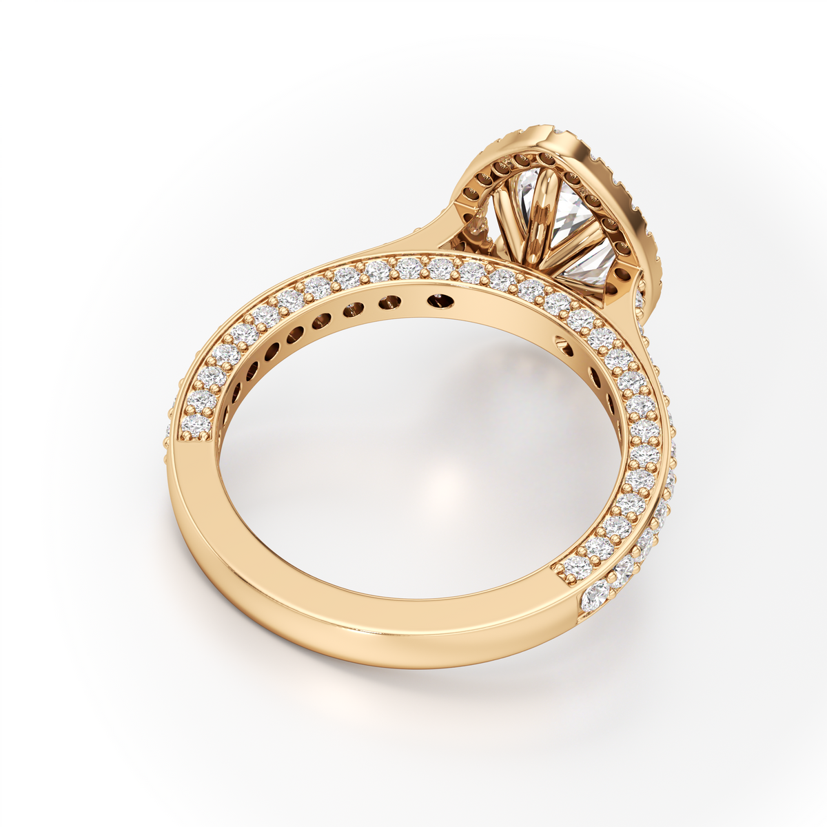 A yellow gold ring with a large oval-cut center stone and a halo setting, featuring a pavé band set with small round stones, shown on a clean white background.