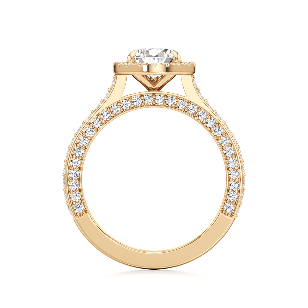 Side view of a gold-tone pear-shaped diamond ring featuring a raised center setting and a pavé diamond band along the shoulders.